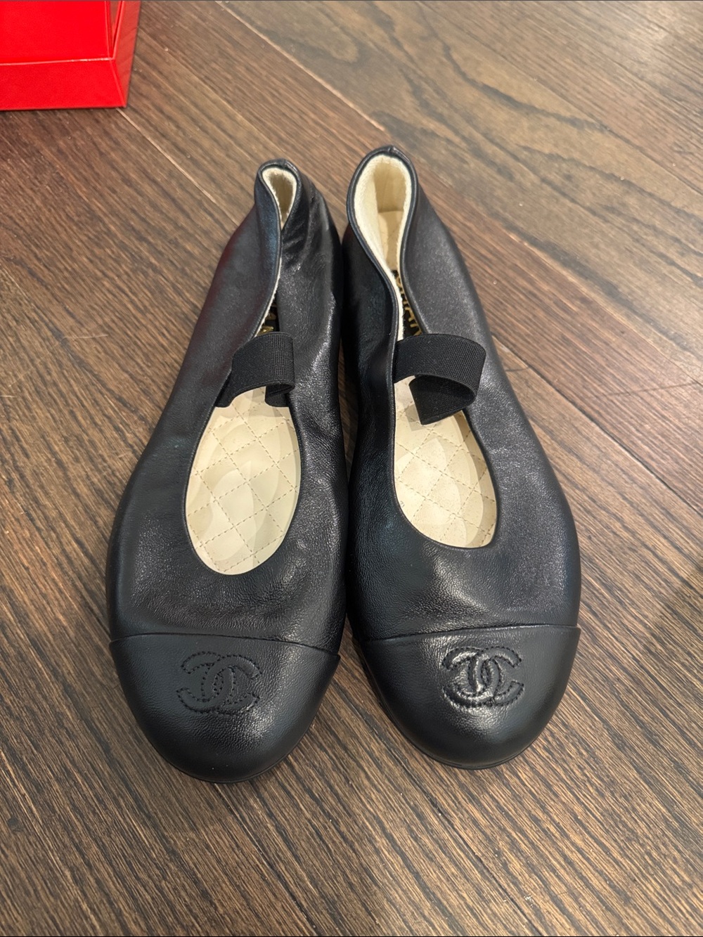 CHANEL Black Leather Ballet Flats with Quilted Cream Insole and Elastic Strap